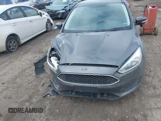 2016 Ford Focus SE with VIN 1FADP3F24GL378506, listed as a IAAI auction lot 41739169 with 50,861 mi miles. Bid and sale history available at carsss.com. Image 12.