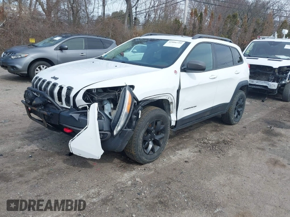 2014 Jeep Cherokee Trailhawk with VIN 1C4PJMBS5EW240375, listed as a IAAI auction lot 41806725 with 127,705 mi miles. Bid and sale history available at carsss.com. Image 17.