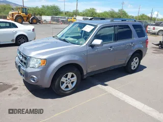 2008 Ford Escape Hybrid z VIN 1FMCU49HX8KC68082, wystawiony jako IAAI lot #42806471 z przebiegiem 104 848 mil mil oraz . Historia ofert i sprzedaży dostępna na DreamBid. Obrazek 2.