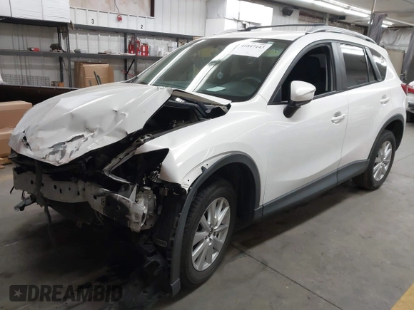 2016 Mazda CX-5 Sport with VIN JM3KE2BY8G0787130, listed as a IAAI auction lot 41847443 with 96,611 mi miles. Bid and sale history available at carsss.com. Image 2.