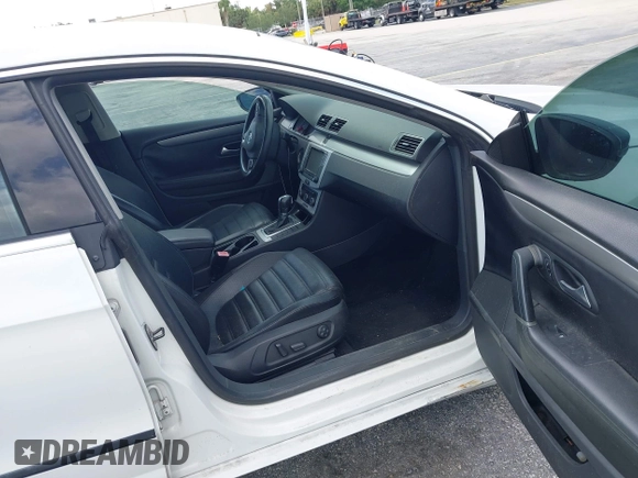 2012 Volkswagen CC R-Line with VIN WVWMP7AN5CE528091, listed as a IAAI auction lot 42074271 with 121,308 mi miles and . Bid and sale history available at DreamBid. Image 5.