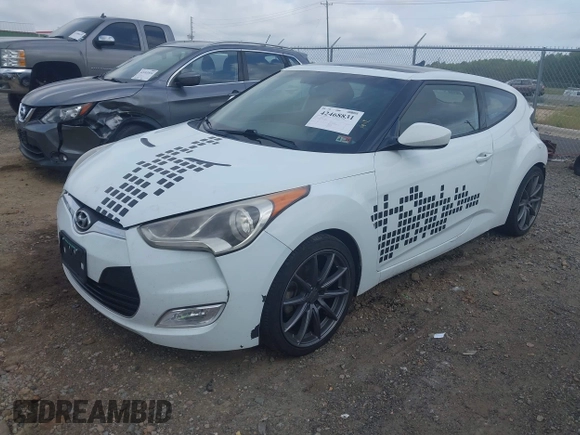 2013 Hyundai Veloster w/Gray Int z VIN KMHTC6AD3DU131703, wystawiony jako IAAI lot #42468831 z przebiegiem 188 513 mil mil oraz . Historia ofert i sprzedaży dostępna na DreamBid. Obrazek 18.