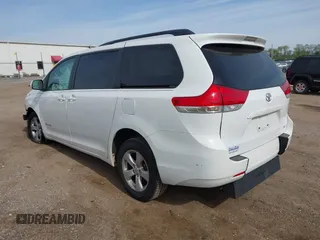 2014 Toyota Sienna LE AAS with VIN 5TDKK3DC0ES439163, listed as a IAAI auction lot 42155274 with Not provided miles and . Bid and sale history available at DreamBid. Image 3.