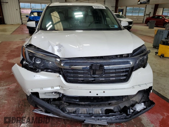 2017 Honda Ridgeline RTL-E with VIN 5FPYK3F72HB002890, listed as a Copart auction lot 57699735 with 128,813 mi miles and Salvage title. Bid and sale history available at DreamBid. Image 5.