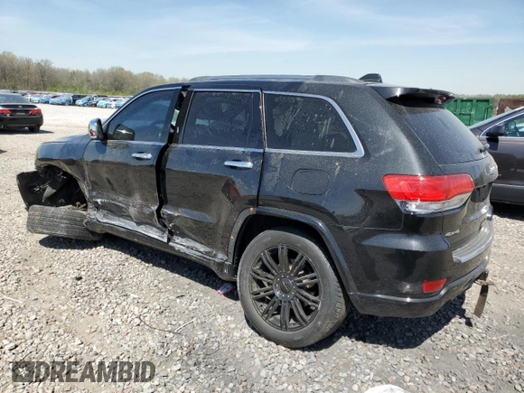 2015 Jeep Grand Cherokee Overland with VIN 1C4RJFCG3FC104439, listed as a Copart auction lot 50780295 with 196,549 mi miles and Salvage Title. Bid and sale history available at carsss.com. Image 2.