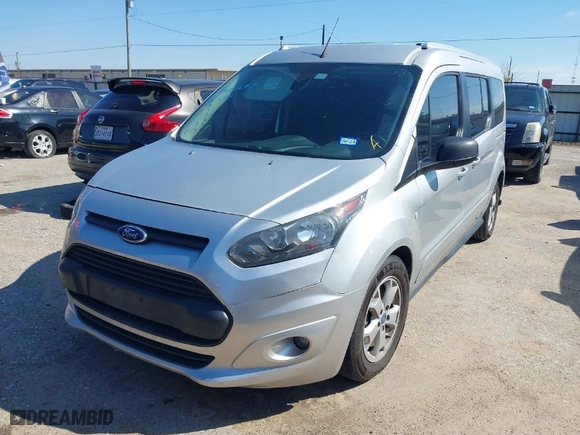 2015 Ford Transit Connect Wagon XLT with VIN NM0GE9F73F1176890, listed as a IAAI auction lot 41616697 with 128,674 mi miles. Bid and sale history available at carsss.com. Image 2.