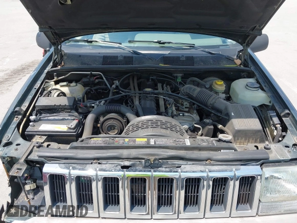 1995 Jeep Grand Cherokee Laredo with VIN 1J4FX58S0SC716398, listed as a IAAI auction lot 42647346 with 58,184 mi miles and . Bid and sale history available at DreamBid. Image 10.