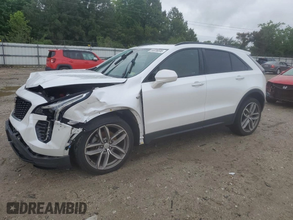 2019 Cadillac XT4 FWD Sport z VIN 1GYFZER49KF199885, wystawiony jako Copart lot #56836895 z przebiegiem 58 486 mil mil oraz Szkoda całkowita • Salvage title. Historia ofert i sprzedaży dostępna na DreamBid. Obrazek 1.