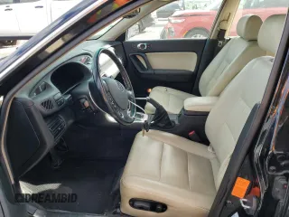 2002 Mazda Millenia z VIN JM1TA221421729790, wystawiony jako Copart lot #84460794 z przebiegiem 68 102 mil mil oraz Szkody całkowita. Historia ofert i sprzedaży dostępna na DreamBid. Obrazek 7.