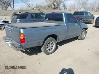 1998 Toyota Tacoma with VIN 4TANL42N6WZ127963, listed as a IAAI auction lot 41861071 with 99,749 mi miles and . Bid and sale history available at DreamBid. Image 4.