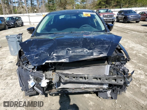 2015 Ford Focus SE with VIN 1FADP3F26FL228606, listed as a Copart auction lot 52525445 with 37,477 mi miles and Salvage Title. Bid and sale history available at DreamBid. Image 5.