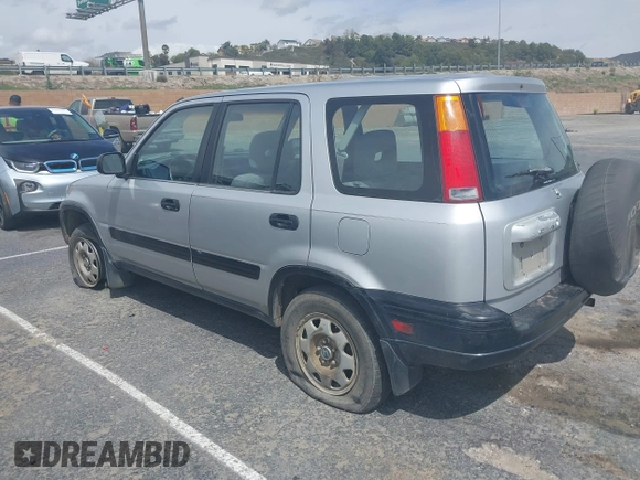 1998 Honda CR-V LX with VIN JHLRD1849WC037776, listed as a IAAI auction lot 41906738 with 265,265 mi miles. Bid and sale history available at carsss.com. Image 3.