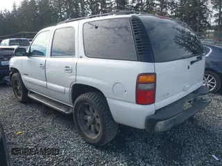 2001 Chevrolet Tahoe LT with VIN 1GNEK13T31J218674, listed as a IAAI auction lot 41529355 with 231,756 mi miles. Bid and sale history available at carsss.com. Image 3.