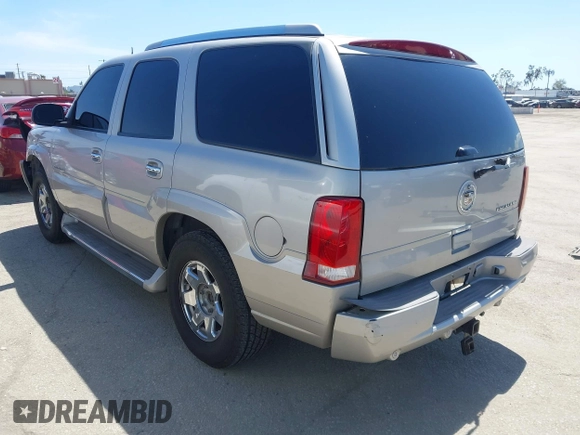 2005 Cadillac Escalade z VIN 1GYEC63N65R249827, wystawiony jako IAAI lot #42247650 z przebiegiem 254 052 mil mil oraz . Historia ofert i sprzedaży dostępna na DreamBid. Obrazek 3.