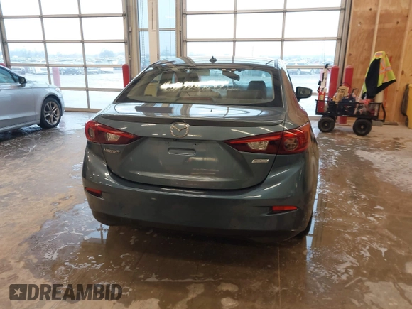 2014 Mazda 3 S Grand Touring with VIN JM1BM1W31E1182703, listed as a IAAI auction lot 41470742 with 123,956 mi miles and . Bid and sale history available at DreamBid. Image 16.