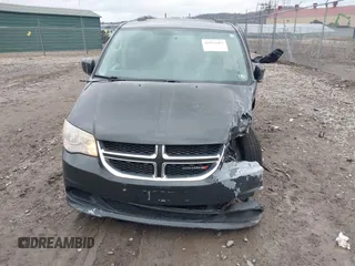 2012 Dodge Grand Caravan SXT with VIN 2C4RDGCG8CR242235, listed as a IAAI auction lot 41922083 with 124,306 mi miles and . Bid and sale history available at DreamBid. Image 12.