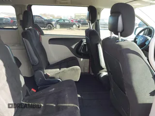 2014 Dodge Grand Caravan SXT with VIN 2C4RDGCG8ER245316, listed as a IAAI auction lot 41871425 with 150,361 mi miles and . Bid and sale history available at DreamBid. Image 8.