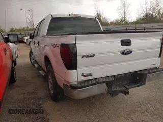 2014 Ford F-150 XL with VIN 1FTFW1EF1EFC93570, listed as a IAAI auction lot 41652787 with 265,015 mi miles. Bid and sale history available at carsss.com. Image 3.