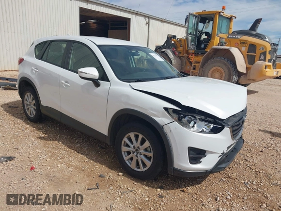 2016 Mazda CX-5 Sport with VIN JM3KE2BYXG0683318, listed as a IAAI auction lot 41777751 with 116,922 mi miles. Bid and sale history available at carsss.com. Image 1.