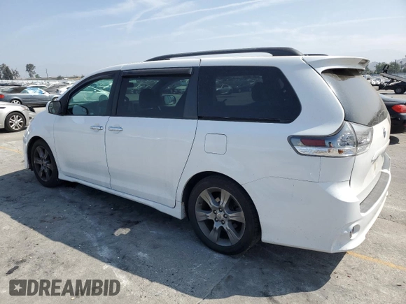 2015 Toyota Sienna SE with VIN 5TDXK3DC7FS601720, listed as a Copart auction lot 59959325 with 262,419 mi miles and Salvage title. Bid and sale history available at DreamBid. Image 2.