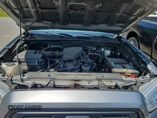 2018 Toyota Tacoma SR with VIN 5TFSX5EN6JX062775, listed as a IAAI auction lot 42774090 with 146,583 mi miles and . Bid and sale history available at DreamBid. Image 3.