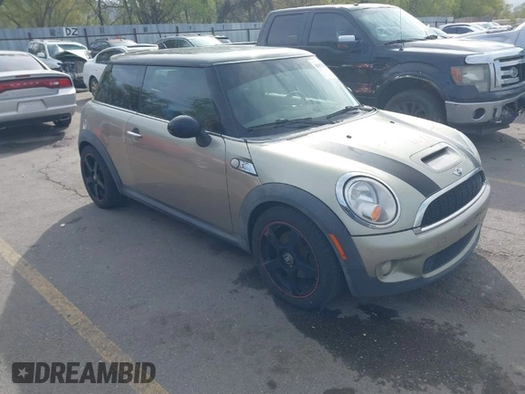 2009 MINI Hardtop S with VIN WMWMF73569TW87929, listed as a IAAI auction lot 42057214 with 164,922 mi miles and . Bid and sale history available at DreamBid. Image 1.