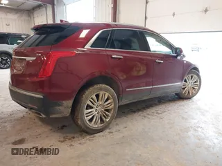 2018 Cadillac XT5 Premium Luxury AWD z VIN 1GYKNFRS6JZ114464, wystawiony jako IAAI lot #42320302 z przebiegiem 61 231 mil mil oraz . Historia ofert i sprzedaży dostępna na DreamBid. Obrazek 4.
