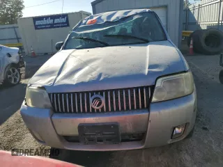 2007 Mercury Mariner Convenience z VIN 4M2YU80Z47KJ11826, wystawiony jako Copart lot #77327954 z przebiegiem 195 320 mil mil oraz Szkody całkowita. Historia ofert i sprzedaży dostępna na DreamBid. Obrazek 5.