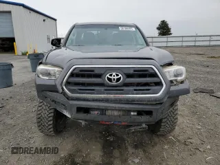 2017 Toyota Tacoma SR5 z VIN 3TMCZ5AN7HM094624, wystawiony jako Copart lot #58166405 z przebiegiem 84 877 mil mil oraz Szkoda całkowita • Salvage title. Historia ofert i sprzedaży dostępna na DreamBid. Obrazek 5.
