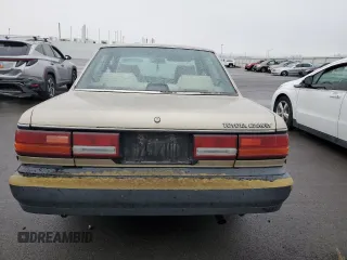 1991 Toyota Camry z VIN 4T1SV24E0MU379572, wystawiony jako Copart lot #78090294 z przebiegiem 242 052 mil mil oraz Szkoda całkowita • Salvage title. Historia ofert i sprzedaży dostępna na DreamBid. Obrazek 6.