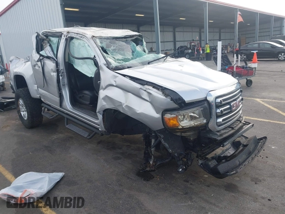 2016 GMC Canyon 2WD SLE with VIN 1GTG5CE34G1252553, listed as a IAAI auction lot 41609585 with 128,720 mi miles. Bid and sale history available at carsss.com. Image 1.