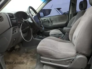 1999 Isuzu Rodeo S with VIN 4S2CM58W4X4339262, listed as a Copart auction lot 82804154 with 177,097 mi miles and Salvage Title. Bid and sale history available at carsss.com. Image 7.