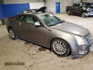2014 Cadillac CTS Performance with VIN 1G6DG1E32E0166570, listed as a Copart auction lot 58815315 with 46,870 mi miles and Salvage title. Bid and sale history available at DreamBid. Image 4.