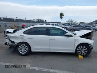 2014 Volkswagen Passat S z VIN 1VWAT7A30EC113737, wystawiony jako IAAI lot #42029001 z przebiegiem 115 378 mil mil oraz . Historia ofert i sprzedaży dostępna na DreamBid. Obrazek 14.