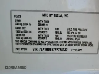 2023 Tesla Model Y Long Range z VIN 7SAYGDEE7PF788932, wystawiony jako Copart lot #52822515 z przebiegiem 33 007 mil mil oraz Szkoda całkowita • Salvage title. Historia ofert i sprzedaży dostępna na DreamBid. Obrazek 14.
