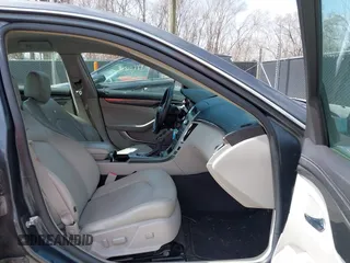 2009 Cadillac CTS RWD w/1SA with VIN 1G6DF577790133127, listed as a IAAI auction lot 41810358 with 220,278 mi miles. Bid and sale history available at carsss.com. Image 5.