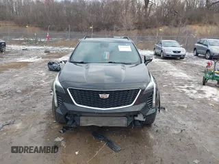 2021 Cadillac XT4 AWD Sport with VIN 1GYFZFR49MF065225, listed as a IAAI auction lot 41191994 with 58,095 mi miles and . Bid and sale history available at DreamBid. Image 12.