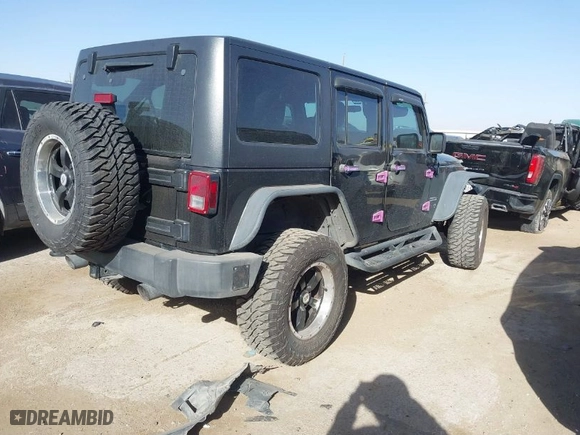 2013 Jeep Wrangler Unlimited Sport with VIN 1C4BJWDG9DL569109, listed as a IAAI auction lot 41207715 with 120,800 mi miles. Bid and sale history available at carsss.com. Image 4.