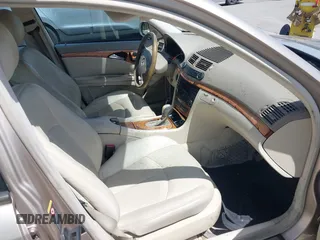 2003 Mercedes-Benz E-Class 3.2L with VIN WDBUF65JX3A236768, listed as a IAAI auction lot 42094824 with 251,896 mi miles. Bid and sale history available at carsss.com. Image 5.