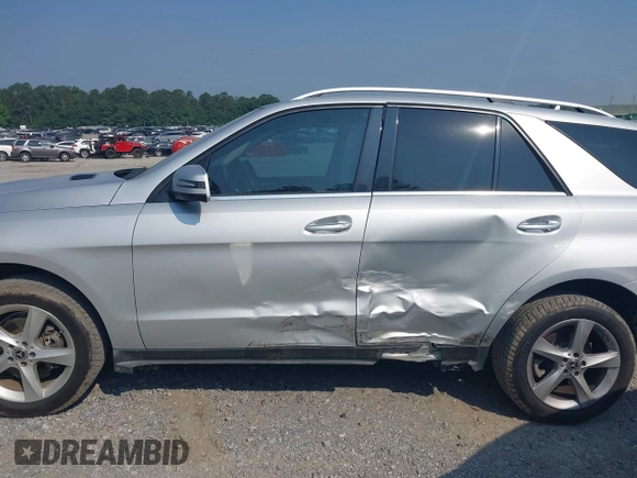 2018 Mercedes-Benz GLE 350 with VIN 4JGDA5JB4JB129369, listed as a IAAI auction lot 42388012 with 94,926 mi miles and . Bid and sale history available at DreamBid. Image 14.