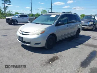 2007 Toyota Sienna CE with VIN 5TDZK23CX7S037146, listed as a IAAI auction lot 41916791 with 220,366 mi miles. Bid and sale history available at carsss.com. Image 2.