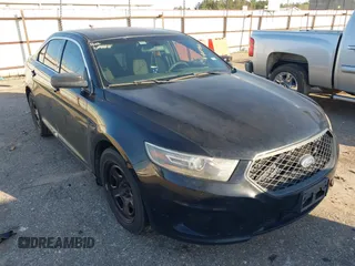 2016 Ford Sedan Police Interceptor with VIN 1FAHP2MT5GG104201, listed as a IAAI auction lot 41607842 with 154,885 mi miles. Bid and sale history available at carsss.com. Image 1.