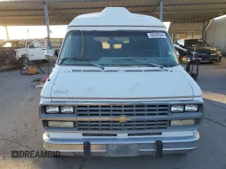 1993 Chevrolet Chevy Van z VIN 1GBEG25K1PF325078, wystawiony jako Copart lot #82640544 z przebiegiem 115 462 mil mil oraz Czysty tytuł • Clean title. Historia ofert i sprzedaży dostępna na DreamBid. Obrazek 5.