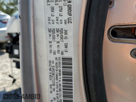 2013 Dodge Journey American Value with VIN 3C4PDCAB1DT715799, listed as a Copart auction lot 52404815 with 185,559 mi miles and Salvage Title. Bid and sale history available at DreamBid. Image 13.