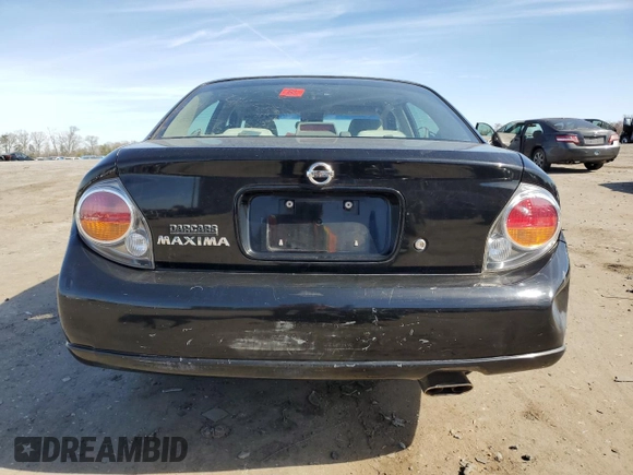 2002 Nissan Maxima GXE z VIN JN1DA31D92T409717, wystawiony jako Copart lot #49413035 z przebiegiem 90 697 mil mil oraz Szkoda całkowita • Salvage title. Historia ofert i sprzedaży dostępna na DreamBid. Obrazek 6.