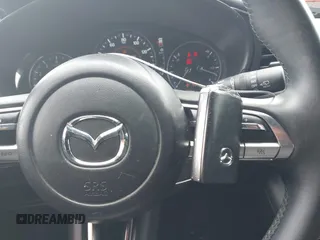 2019 Mazda 3 z VIN JM1BPAJM7K1133105, wystawiony jako IAAI lot #42473214 z przebiegiem 47 751 mil mil oraz . Historia ofert i sprzedaży dostępna na DreamBid. Obrazek 11.