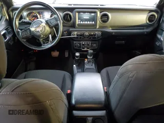 2021 Jeep Gladiator 80th Anniversary with VIN 1C6HJTAG7ML619025, listed as a Copart auction lot 63309365 with 69,126 mi miles and Salvage title. Bid and sale history available at DreamBid. Image 8.
