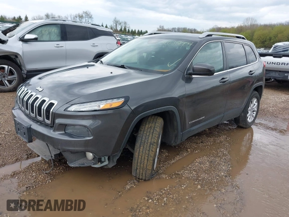 2014 Jeep Cherokee Altitude with VIN 1C4PJMCB2EW181848, listed as a IAAI auction lot 41638004 with 175,813 mi miles. Bid and sale history available at carsss.com. Image 17.