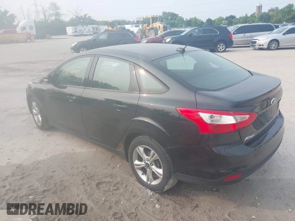 2013 Ford Focus SE with VIN 1FADP3F27DL306677, listed as a IAAI auction lot 42495368 with 96,451 mi miles and . Bid and sale history available at DreamBid. Image 3.