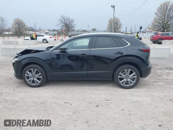 2023 Mazda CX-30 S Select with VIN 3MVDMBBM5PM540662, listed as a IAAI auction lot 42057718 with 16,289 mi miles and . Bid and sale history available at DreamBid. Image 14.